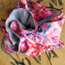 Reversible gift bag in pinks and greys.